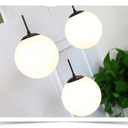 Modern white and black cream glass ball chandelier with three frosted glass ball pendant lights for staircase decorbites cream glass