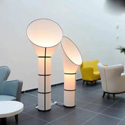 Modern white and black horn floor lamp with geometric accents and soft diffused glow for bedroom decorbites floor lamp