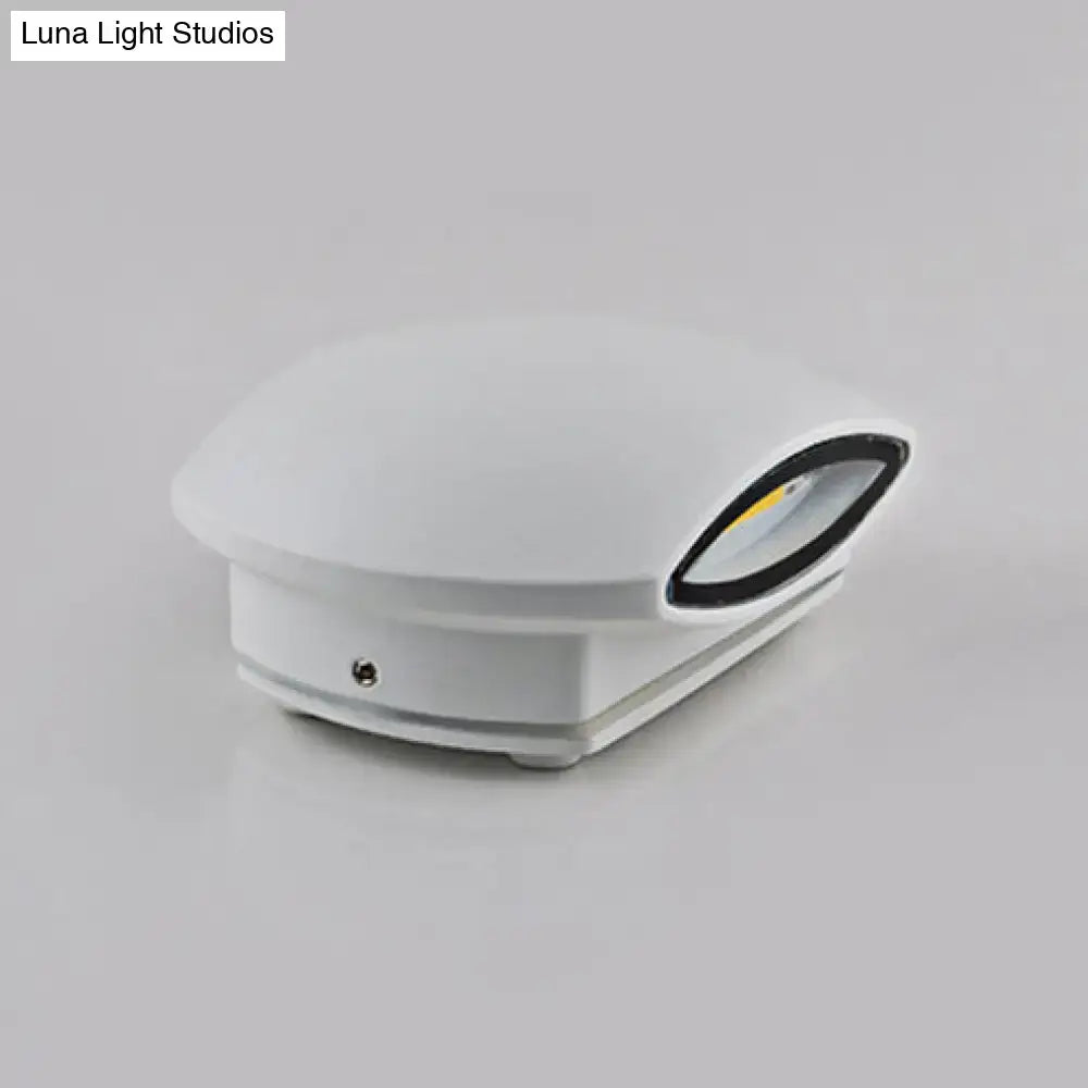 Modern white and black oval led wall lamp with direct wired electric connection and sleek outdoor design