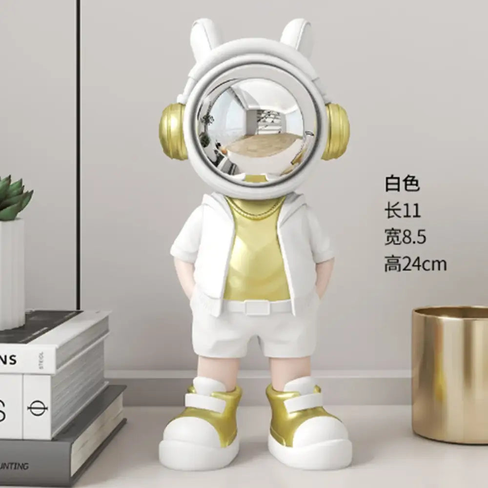 Modern white and blue astronaut resin sculpture with gold accents and reflective visor for living room decor
