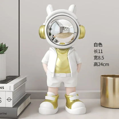 Modern white and blue astronaut resin sculpture with gold accents and reflective visor for living room decor