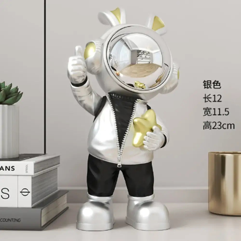 Modern white and blue astronaut resin sculpture featuring a silver and gold astronaut resin figurine for living room decor