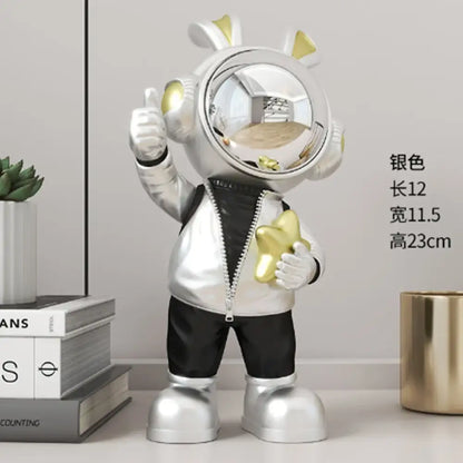 Modern white and blue astronaut resin sculpture featuring a silver and gold astronaut resin figurine for living room decor