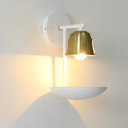 Modern white and brass bell metal sconce with polished brass shade and white metal arm for bedroom wall lighting