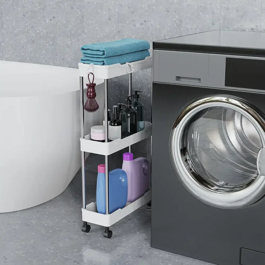 White three-tier rolling utility cart with chrome frame and black wheels holding teal towels and laundry products for bathroom storage rack