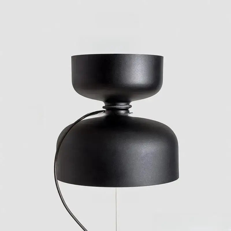 Black matte pendant light with minimalist stacked dome shades for dining room by decorbites designer iron chandelier