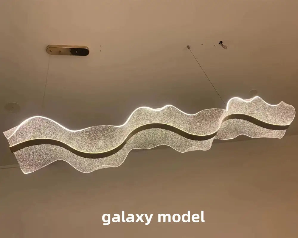Modern white and gold acrylic ribbon led pendant with silver wavy led chandelier and dark accent stripes for dining room decorbites acrylic ribbon
