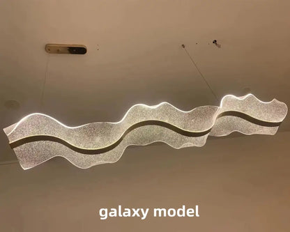 Modern white and gold acrylic ribbon led pendant with silver wavy led chandelier and dark accent stripes for dining room decorbites acrylic ribbon