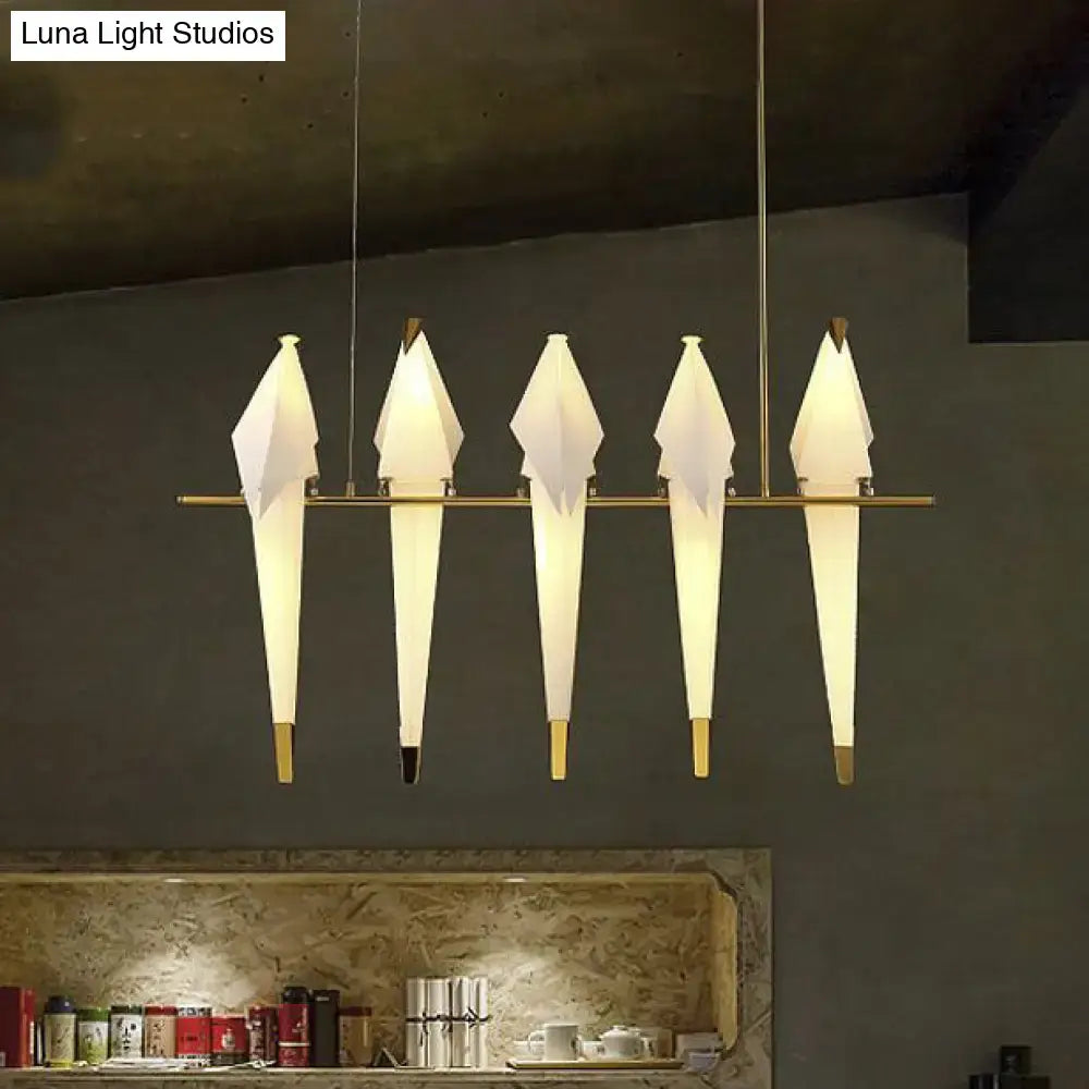 DecorBites™ modern bird shaped island pendant light with five white paper shades and a brass bar fixture