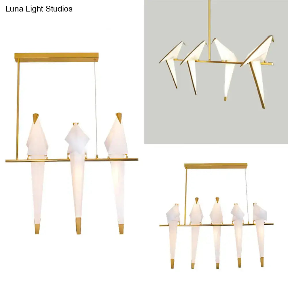 Decorbites modern gold-toned bird shaped island pendant light with translucent white paper shades for bedroom