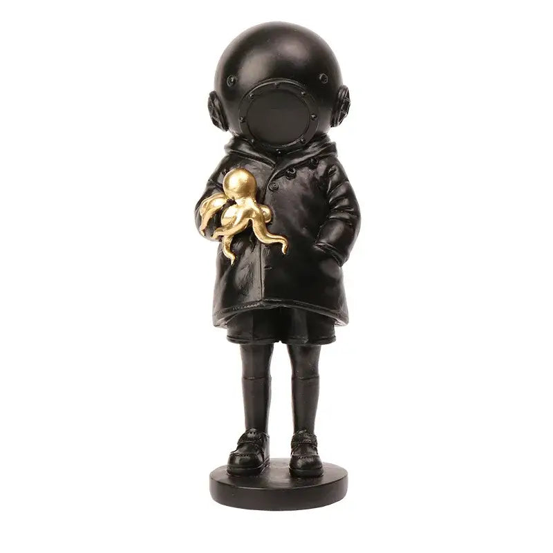 Black resin deepsea diver sculpture of child in vintage helmet and coat holding golden octopus for living room decor