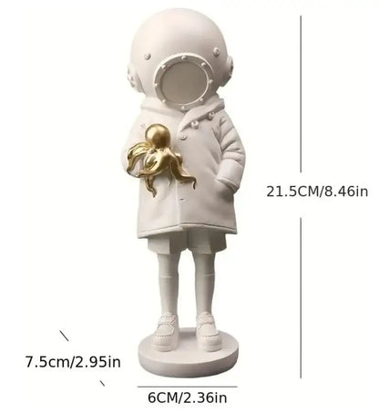 Modern white and gold deepsea diver sculpture featuring a resin child astronaut helmet figurine holding a golden octopus