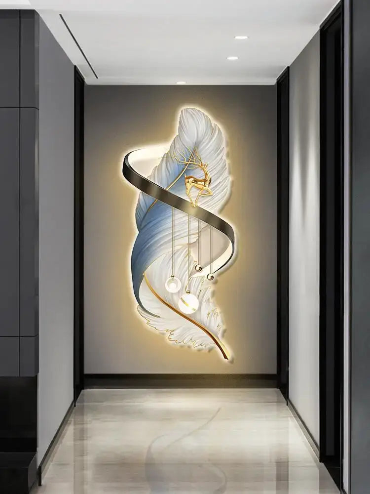Modern white and gold feather led wall lamp featuring illuminated blue and white stylized feather with hanging lights