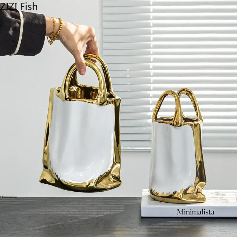 Modern white and gold handbag ceramic vase with glossy finish for living room decor featuring decorbites golden handbag design