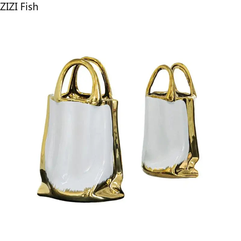 Modern white and gold handbag ceramic vase with gold-accented sculpted handles and glossy interiors for living room decorbites golden handbag
