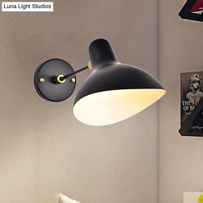 Modern black matte wall mounted lamp with adjustable arm and brass accents for living room led incandescent fluorescent use