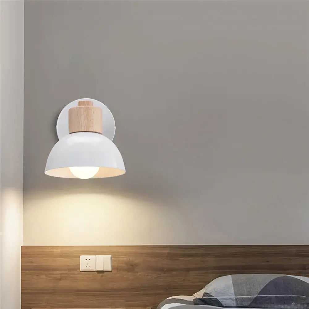 Modern white and iron wood led wall lamp featuring a white metal sconce with natural wood accent by decorbites iron wood