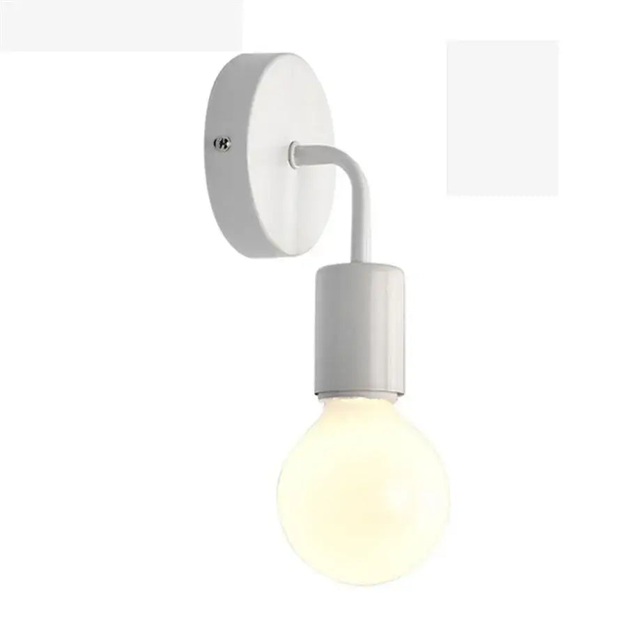 Minimalist white wall lamp with curved arm and exposed bulb featuring decorbites iron wood led elements for bedroom decor