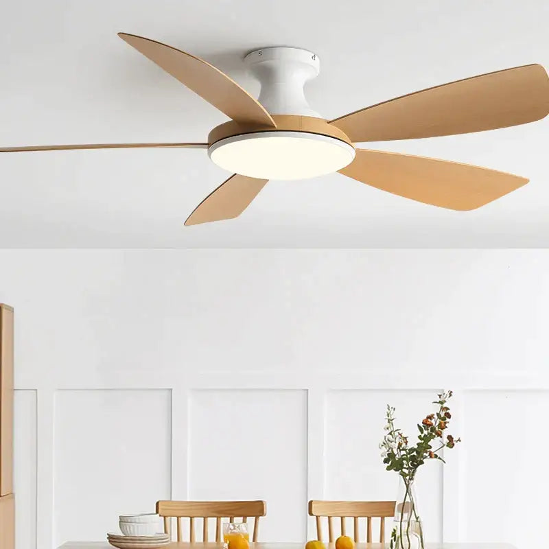 Modern ceiling fan with five light brown wooden blades and white housing featuring an integrated bedroom led light