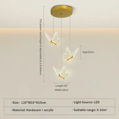 Gold-toned ceiling-mounted pendant light with three translucent acrylic butterflies in warm gold finish for bedroom use