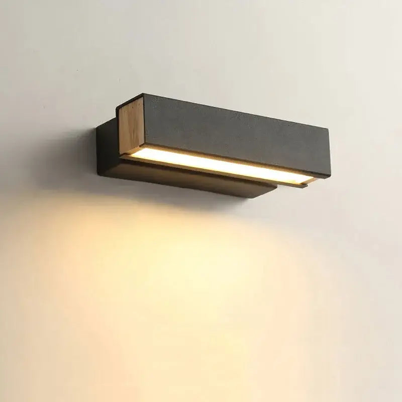 Modern white and wood adjustable wooden led wall lamp with matte black frame and warm ambient lighting for bedroom decorbites