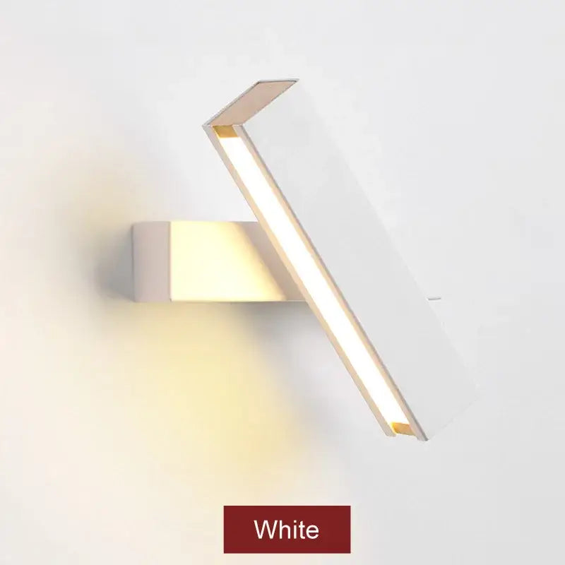 Modern white and wood decorbites adjustable wooden led wall lamp with sleek angular design emitting warm light for bedroom decor