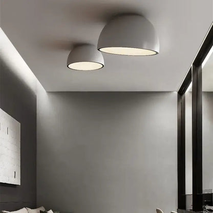 Two sleek matte gray dome duo ceiling lights with warm diffused illumination for modern kitchen lighting