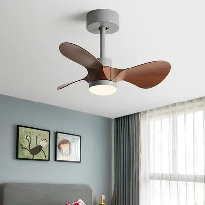 Modern white and wood mini ceiling fan with sleek gray metal housing warm wooden blades and integrated led light fixture