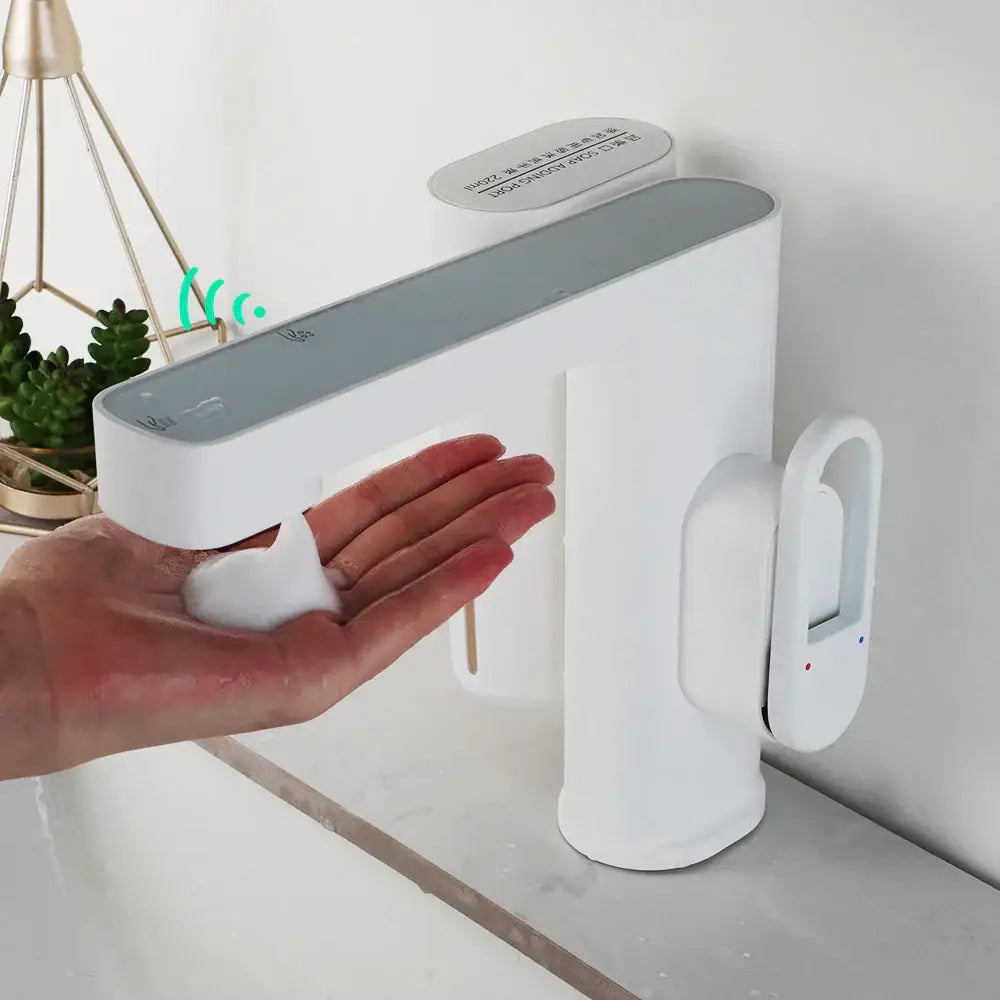 Modern white and gray automatic sensor foam soap dispenser with sleek design for bathroom sink sensor faucet use