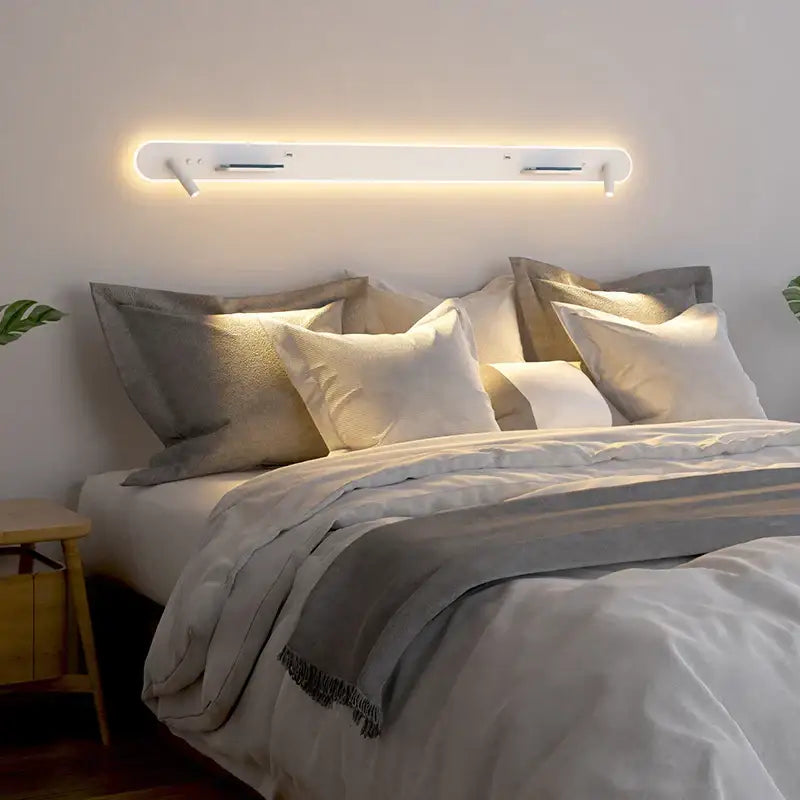 Modern white bedside wall lamp with sleek led headboard light and wireless charging for bedroom use