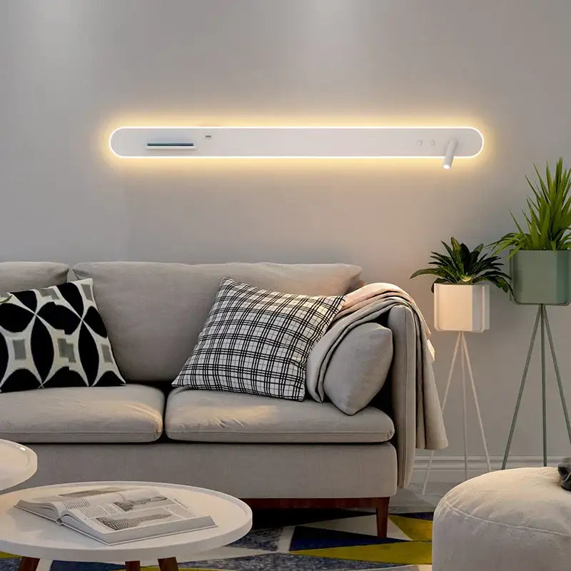 Modern white bedside wall lamp with sleek led wall sconce design and integrated adjustable spotlight for bedroom use