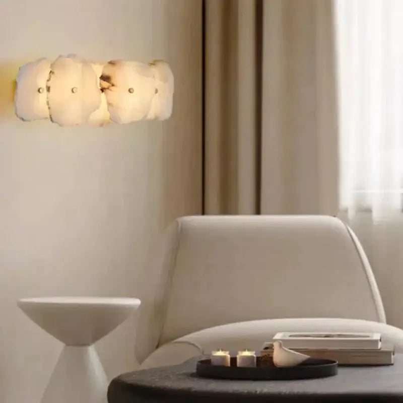 Modern white and beige stone brass wall lamp with cream segmented design for bedroom decorbites brass wall lamp