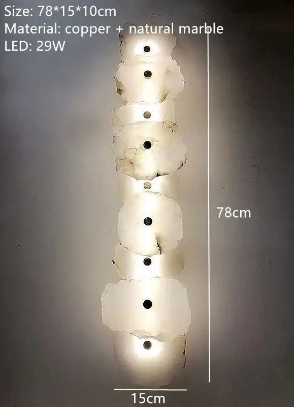 Modern white and beige stone brass wall lamp with stacked marble segments and black led lights for bedroom decorbites brass wall lamp