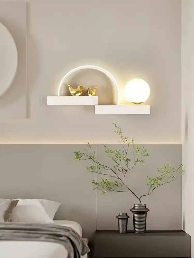 Modern white bird wall lights feature a sleek floating shelf with curved led arch and golden decorbites bird wall figurines