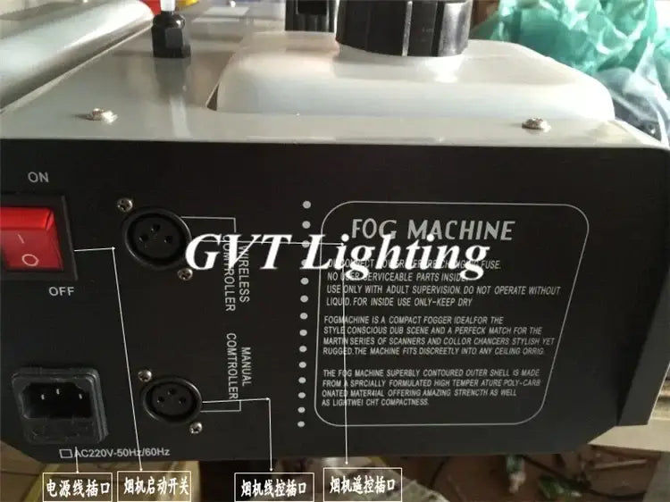Back view of black gvt lighting 1500w smoke machine with white tank and labeled ports for power and controller connections