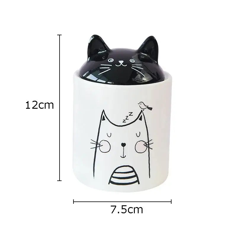 Modern white and black cat ceramic jewelry jar with glossy black cat lid and whimsical bird decorbites black cat pot