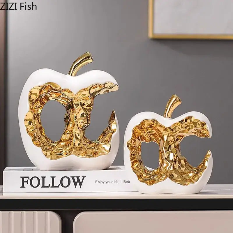 Modern white ceramic apple sculpture with gold metallic cutout design by zizi fish ideal for desk decoration