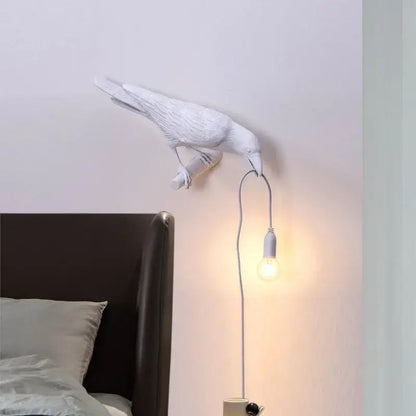 Modern white ceramic wall lamp with dangling bulb featuring decorbites designer bird wall for bedroom light decor