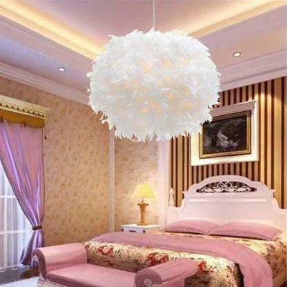 Modern white and black feather pendant light with a soft fluffy texture hanging in a bedroom cloud design