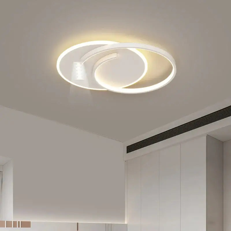 Modern white circular led chandelier with sleek intertwined ring design ideal for living room decorbites grille led lighting