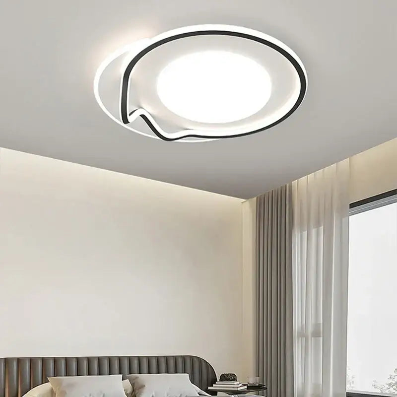 Modern white and black living chandelier lights with a circular design and illuminated central panel for dining rooms