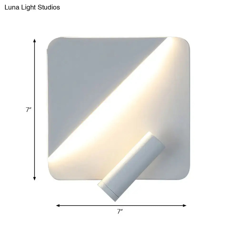 Modern white and black minimalist led spotlight wall lamp with a sleek square base and adjustable cylindrical fixture for bedroom use