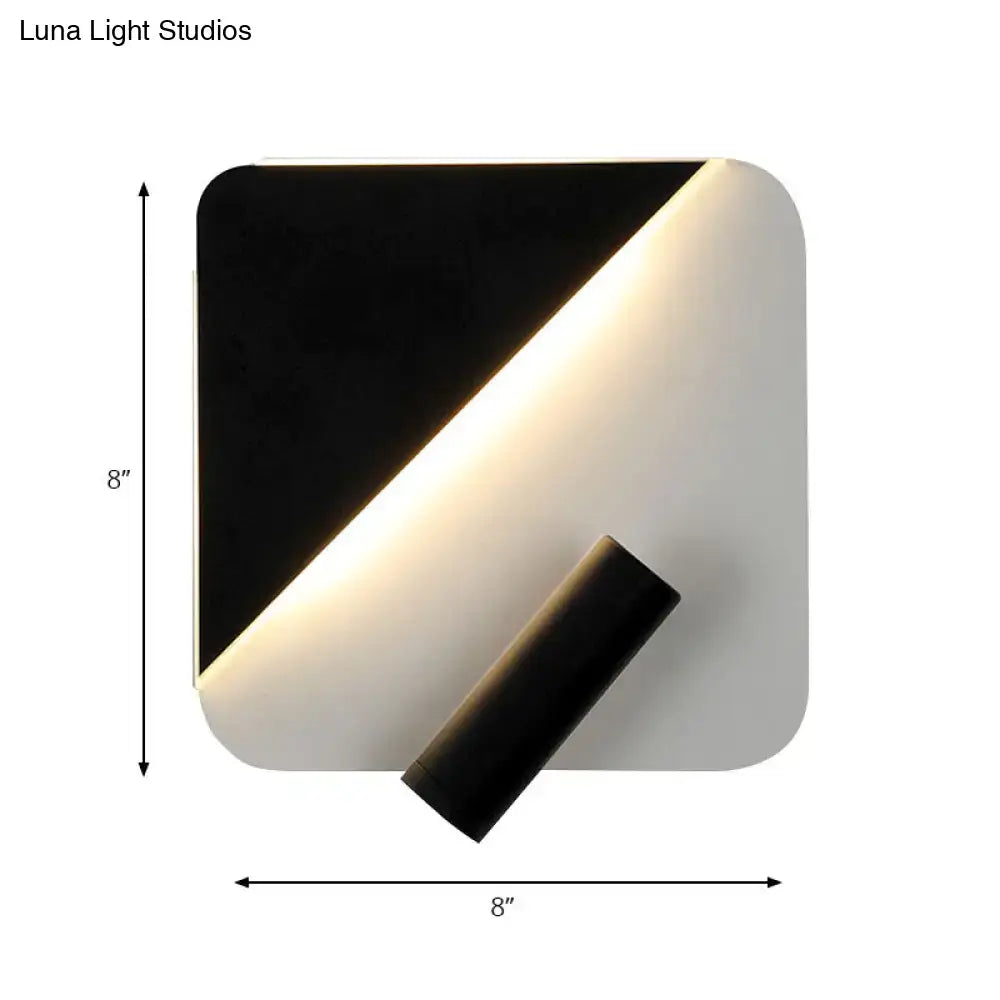 Modern white and black minimalist led spotlight wall lamp with a sleek square design and warm diagonal illumination for bedroom use