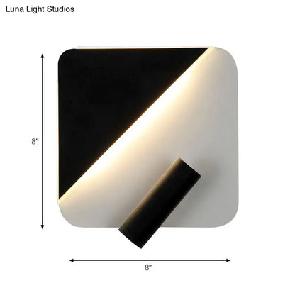 Modern white and black minimalist led spotlight wall lamp with a sleek square design and warm diagonal illumination for bedroom use