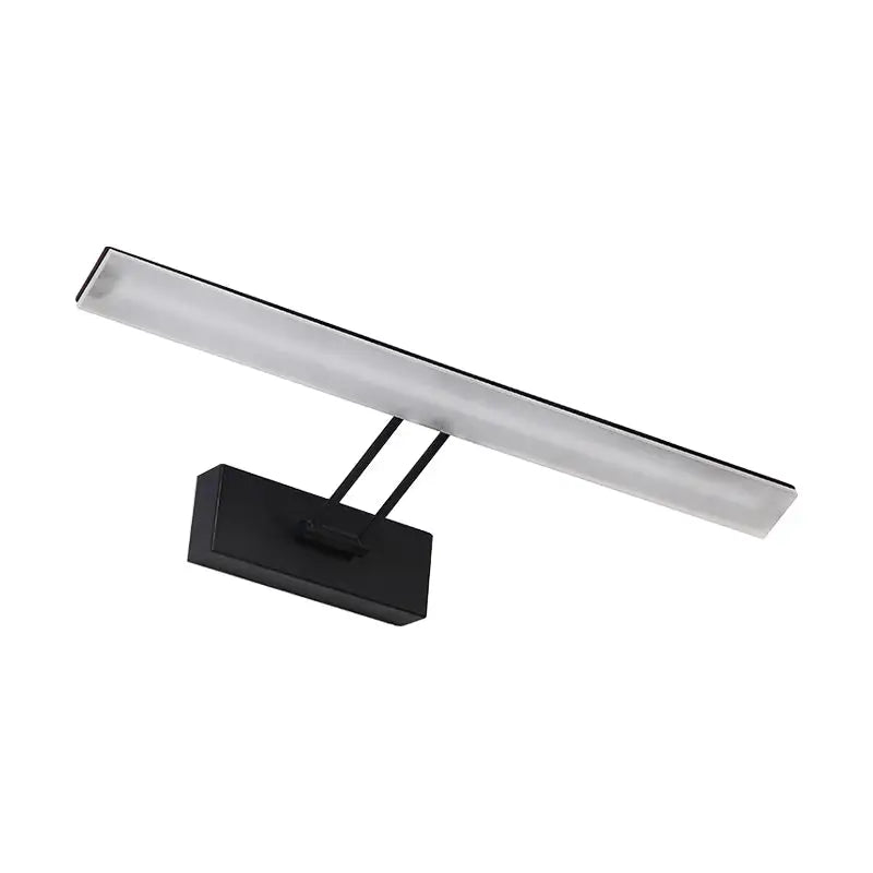Modern black wall light with rectangular design and frosted glass diffuser emitting warm white light for bathroom use