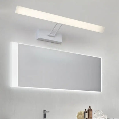Modern white rectangular led wall light with sleek design and warm white light above integrated bathroom mirror