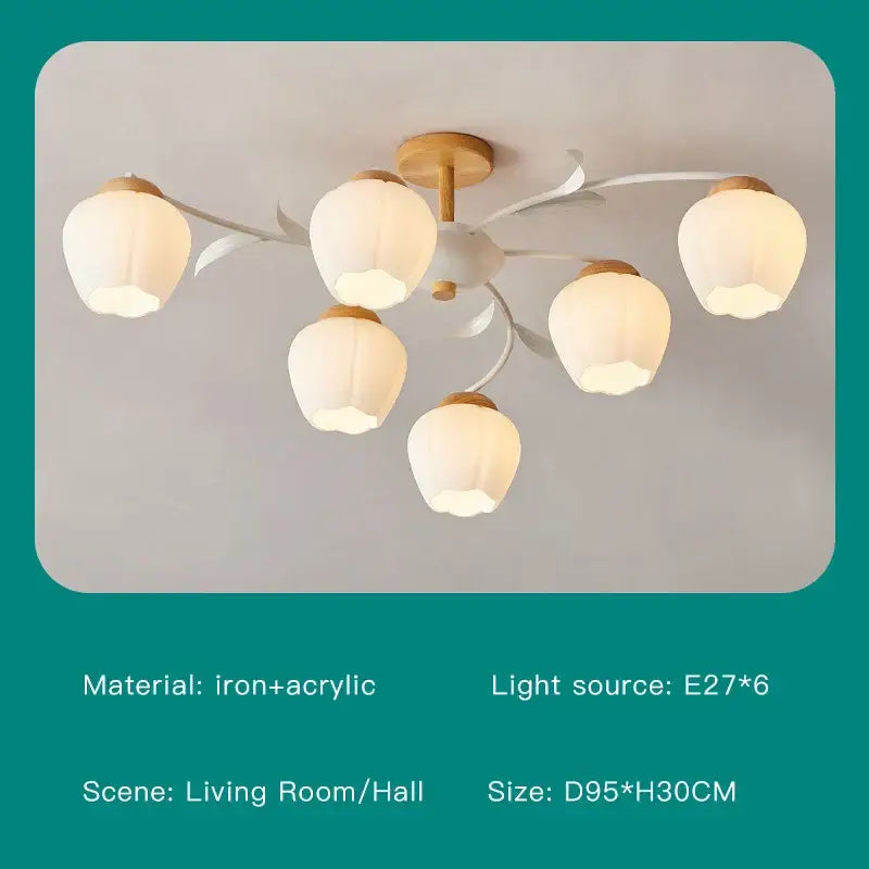Modern white branch ceiling chandelier with five off-white flower-shaped acrylic shades on a white iron frame with wood accents decorbites branch ceiling