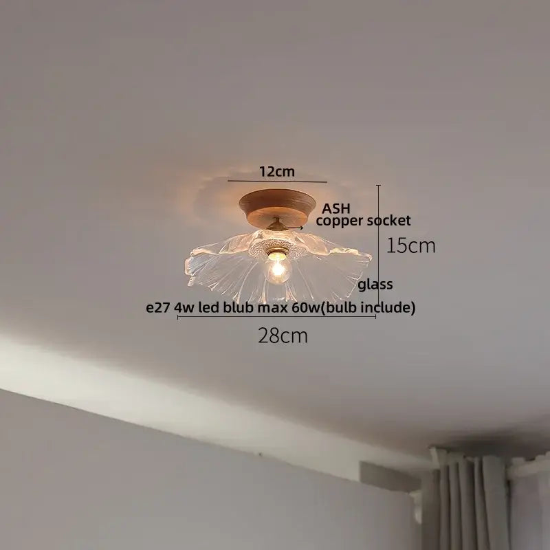 Modern white and brass ceramic led ceiling lamp with a translucent glass flower design and ash copper socket with 4w led bulb