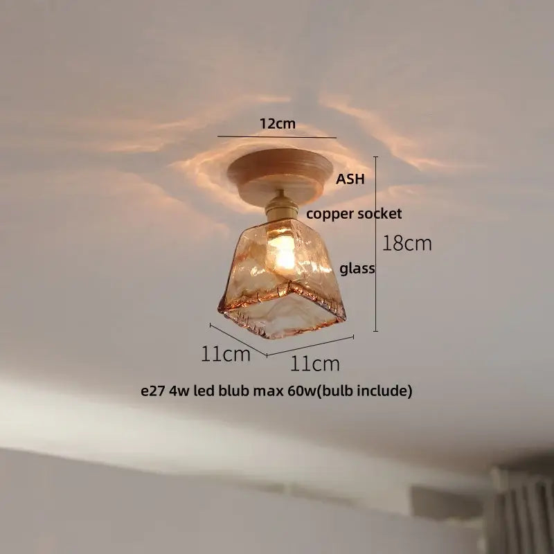 Modern ceramic led ceiling lamp with warm-toned faceted glass pendant, copper socket, and wooden base for bedroom use