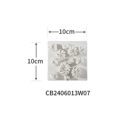 Modern white bud ceramic wall décor pendant featuring three-dimensional flower cluster on square base for bedroom